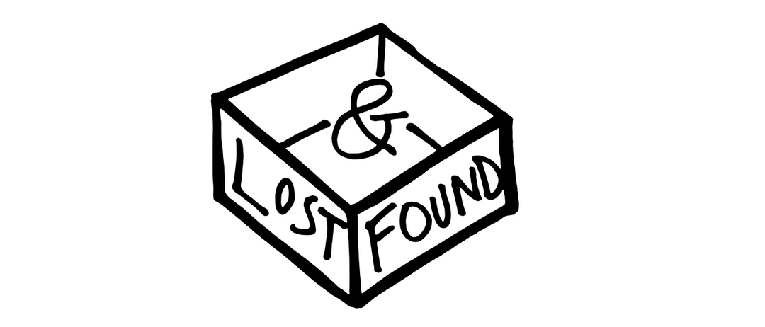 A cuboid-shaped box with the word 'LOST' on the left side and 'FOUND' on the right side. An ampersand symbol is on top of the box.