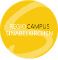 Ein gelbes kreisförmiges Logo mit dem Text 'REGIO CAMPUS SINABELKIRCHEN' in weißer Schrift auf schwarzem Hintergrund.