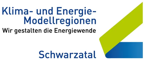 Ein blaues und weißes Grafik zeigt den Text 'und Energie-Regionen, die Energiewende, Schwarzzahl.'