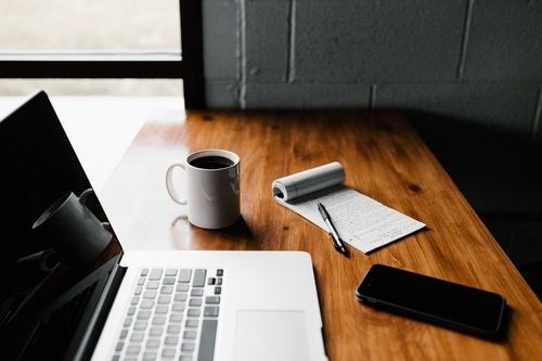 Cup, Furniture, Table, Text, Laptop, Pc, Phone, Tabletop, Mobile Phone, Computer Keyboard