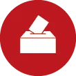 Ein roter Kreis mit einem weißen Wahlurnen-Symbol, ein Papier darin.