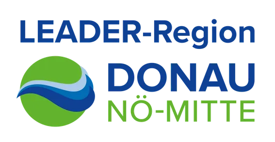 Ein schwarzer Hintergrund mit einem Logo und dem Text 'ADER-Reg DON NÖ-MIT' in blauen und grünen Schriften.