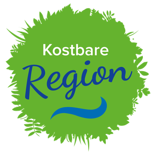Ein grünes Blattdesign mit 'Kastbare Region' in blauem und weißem Text.