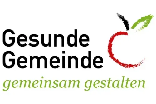 Logo für 'Gesunde Gemeinde', mit einem Apfel und grünen Blättern, vermittelt eine Botschaft über gemeinschaftliche Gesundheit.