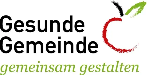Das Logo für Gesunde Gemeinde, eine Initiative für Gemeindegesundheit, zeigt einen stilisierten Apfel mit einem grünen Blatt und einem roten Kreis, der Gesundheit und Gemeinschaft symbolisiert.