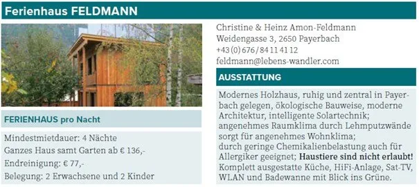 Das Bild zeigt ein modernes Holzhaus mit umweltfreundlichem Design, zentral in Payerbach gelegen. Kontaktieren Sie Christine und Heinz Amon-Feldmann unter Weideggasse 3, 2650 Payerbach, oder per E-Mail an feldmann@lebens-wanderer.com. Das Haus verfügt über eine voll ausgestattete Küche, WLAN, Sat-TV und ein Badezimmer mit Blick in den Wald.