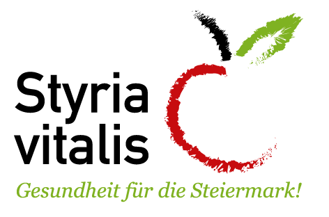 Ein roter Kreis mit grünem Umriss bildet einen stilisierten Apfel, mit dem Text 'Gesundheit für die Steiermark' darunter. Der Hintergrund ist schwarz.