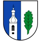 Das Bild zeigt einen heraldischen Schild, der in zwei Teile geteilt ist und links einen weißen Turm mit einem Kreuz oben und rechts ein grünes Eichenblatt zeigt.