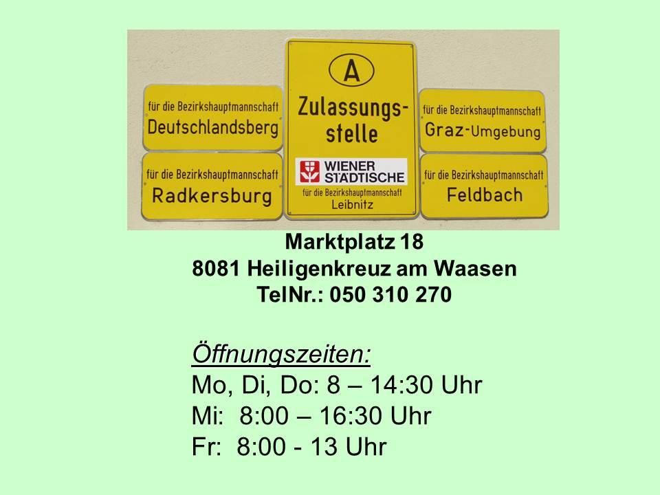Das Bild zeigt ein Schild für das Bezirksfinanzamt in Heiligenkreuz am Waasen. Es listet vier Bezirke auf: Deutschlandsberg, Radkersbrug, Graz-Umgebung und Feldbach. Die Adresse lautet Marktplatz 18, 8081 Heiligenkreuz am Waasen. Telefonnummer 050 310 270 und Öffnungszeiten sind ebenfalls angegeben.