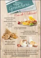 Ein Werbeplakat für eine Bäckerei mit Brot, Milchprodukten und Eiern. Das Datum ist der 1. Februar, und es gibt einen deutschen Satz, der 'Meine kleine Greisserei' lautet.