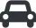 Eine schwarze Silhouette eines Autos mit zwei Scheinwerfern und einer Windschutzscheibe ist auf weißem Hintergrund dargestellt.