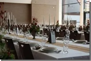 Dining Table, Furniture, Table, Dining Room, Indoors, Reception Room, Restaurant, Linen, Tabletop, Hanukkah Menorah