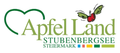 Das Logo von Apfel Land Stubenbergsee in Grün und Weiß zeigt ein Herz und einen Schmetterling mit roten Flügeln. Darunter befindet sich eine Reihe von Regenbogenflaggen.