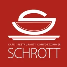 Das Logo von Schrott zeigt einen roten Hintergrund mit einer weißen Schüssel und einem weißen Buchstaben 'S' in der Mitte. Darunter stehen die Worte 'Cafe | Restaurant | Komfortzimmer'. Der Name 'Schrott' ist prominent in Weiß auf dem roten Hintergrund dargestellt.
