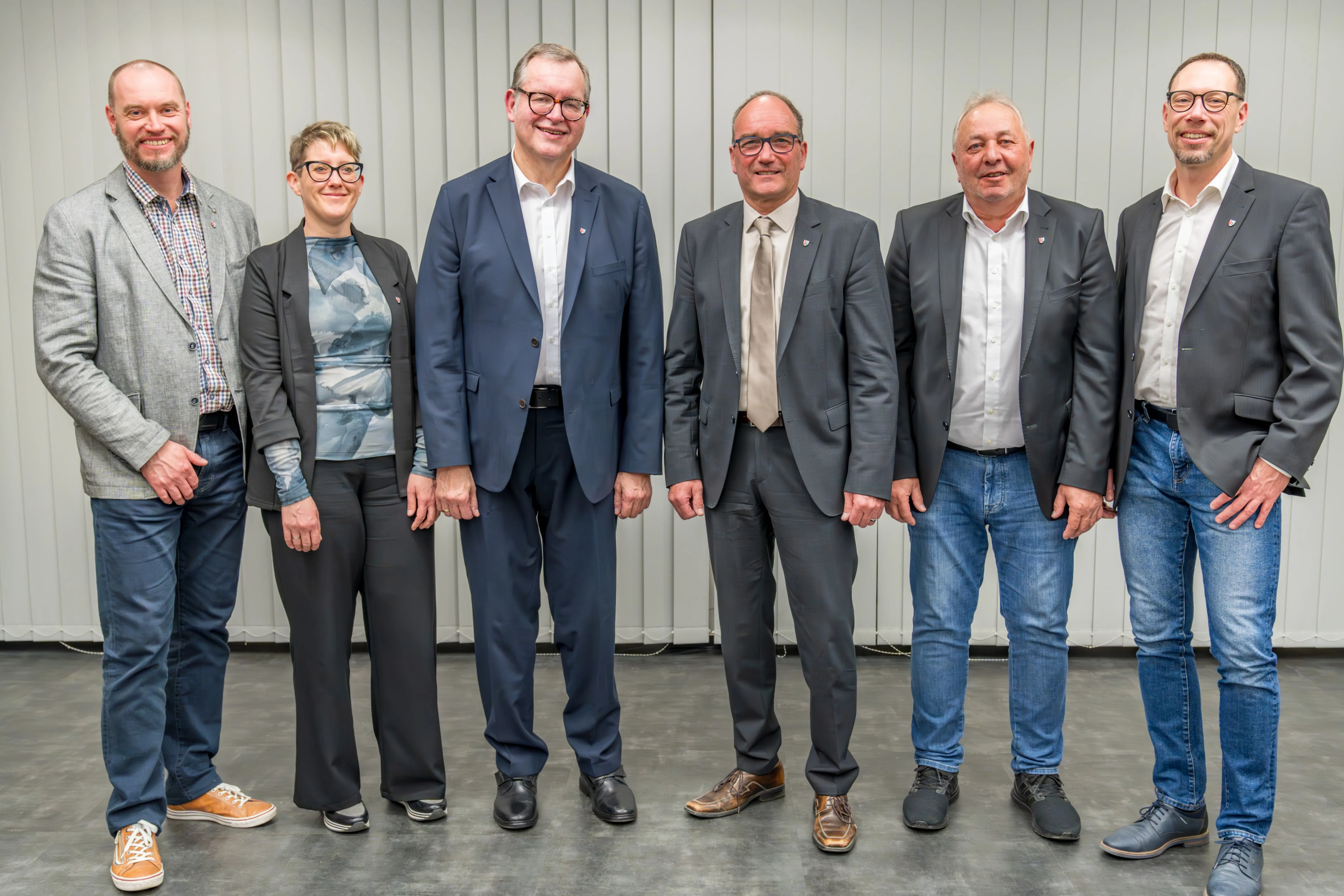 Groupshot, Person, Jeans, Pants, Suit, Coat, Adult, Male, Man, People
