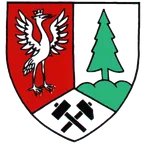 Ein roter und schwarzer Schild mit einem schwarzen Vogel links, einem grünen Baum rechts und zwei Hämmern in der Mitte.