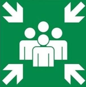 Ein grünes Schild mit weißen Pfeilen, die um eine Gruppe von Menschen herum nach außen zeigen.