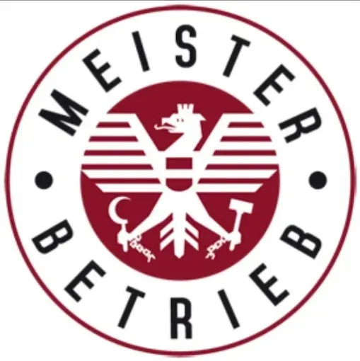 Das Logo zeigt einen stilisierten Adler, der einen Hammer und einen Schild hält, mit den Worten Meisterbetrieb in einem kreisförmigen Muster darum herum.