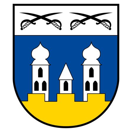 Ein heraldischer Schild mit einem blauen oberen und einem gelben unteren Abschnitt. Über dem Schild sind zwei gekreuzte Schwerter. Der blaue Abschnitt zeigt drei weiße Türme, wobei der mittlere kleiner ist.