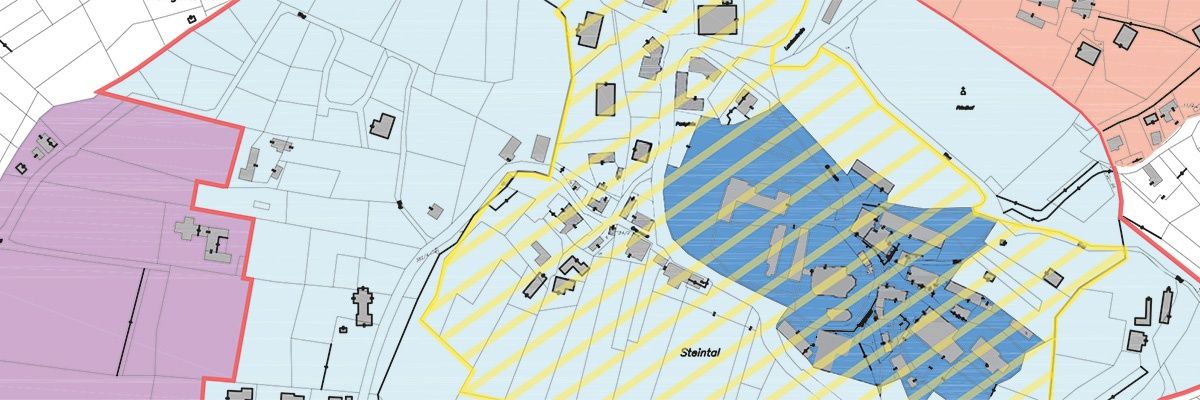 Eine Karte, die eine Stadt mit verschiedenen farbigen Zonen und beschrifteten Bereichen zeigt, einschließlich einer großen blauen Zone namens Steintal.