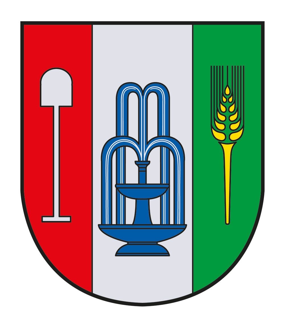 Ein Wappen, das in drei Teile geteilt ist: links rot mit einer Schaufel, mittig weiß mit einem blauen Brunnen und rechts grün mit einer Weizengarbe und einem gelben Stachel.