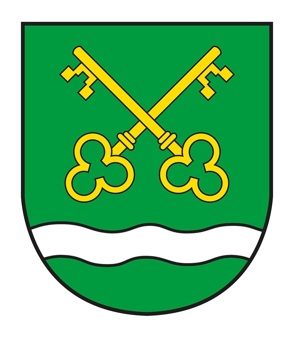 Ein grüner Schild mit einer weißen Wellenlinie am unteren Rand und zwei gelben Schlüsseln, die sich darüber kreuzen.