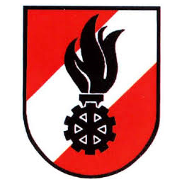 Ein Schild mit rotem und weißem gestreiftem Hintergrund. In der Mitte eine schwarze Flamme mit einem Zahnrad darunter.