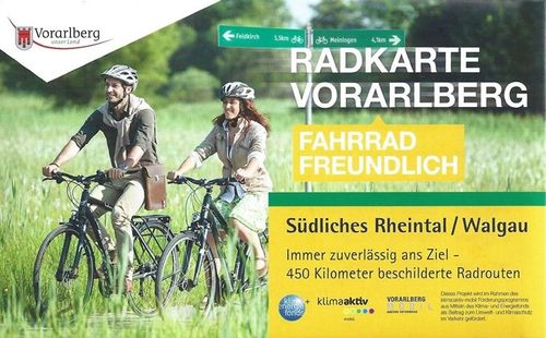 Advertisement, Helmet, Poster, Person, Bicycle, Vehicle, Machine, Wheel, Cycling, Road Sign