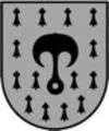 Ein Schild mit grauem Hintergrund und einem schwarzen Design eines Pilzes mit Stiel, umgeben von Schachfiguren in Schwarz und Weiß.