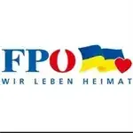 Das Logo von FPO mit dem Text 'Wir leben Heimat' und einem Herz-Symbol. Das Design zeigt die Farben Blau, Rot und Gelb.