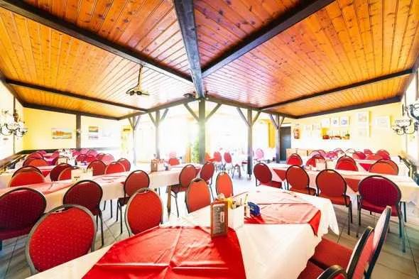 Indoors, Restaurant, Cafeteria, Dining Table, Furniture, Table, Dining Room, Ceiling Fan, Interior Design