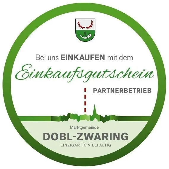 Ein rundes Logo für eine lokale Gemeinschaftspartnerschaft mit einem Hirschemblem und der Aufschrift 'Einkaufsgutschein-Partnerschaft DBL-ZWARING'.