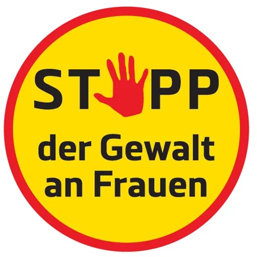 Ein gelbes Schild mit einer roten Hand und dem Text 'STOPP der Gewalt an Frauen'. Es fordert, Gewalt gegen Frauen zu stoppen.
