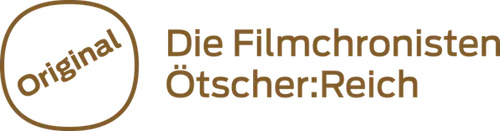 Das Logo für Die Filmchronisten, mit einem Kreis, der 'Original' in Gold und den Text 'Die Filmchronisten Otsscher:Reich' in goldener Schrift zeigt.