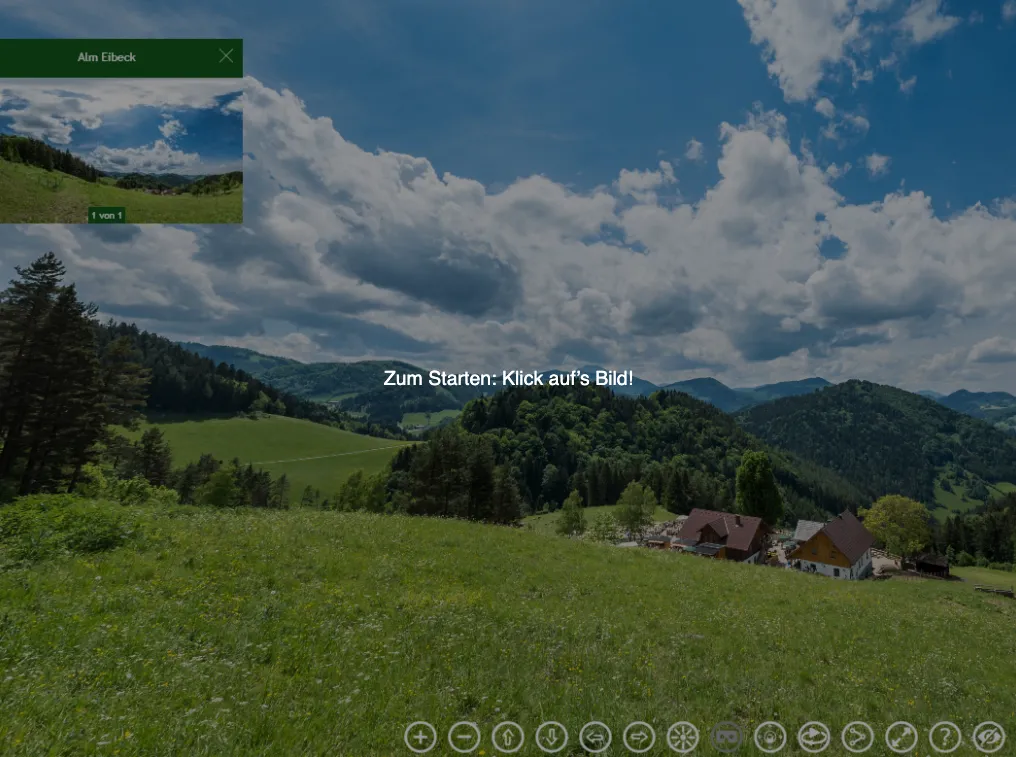 Eine ländliche Landschaft mit einer grünen Wiese und zwei Häusern unter einem blauen Himmel mit Wolken. Ein Knopf lädt zum Klicken zum Starten ein.