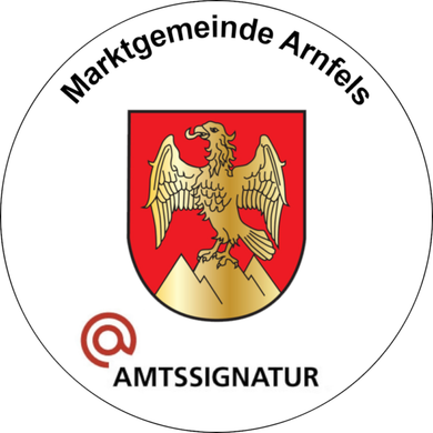 Ein rundes Emblem mit einem goldenen Adler auf einem roten Schild, beschriftet mit 'Marktgemeinde Arnfels' und einem '@' Symbol darunter. Darunter steht der Schriftzug 'AMTSSIGNATUR'.