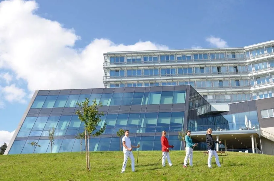 Architecture, Building, Office Building, Campus, College, Person, Walking, Grass, Plant, Lawn