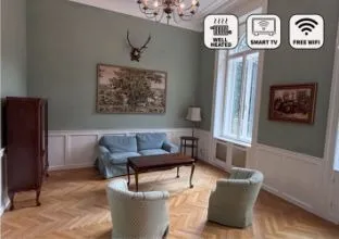 Furniture, Indoors, Living Room, Interior Design, Reception Room, Waiting Room, Home Decor, Flooring, Couch, Table