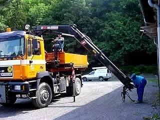 Construction, Construction Crane, Tow Truck, Vehicle, Wheel, Adult, Male, Man, Person, Utility Pole