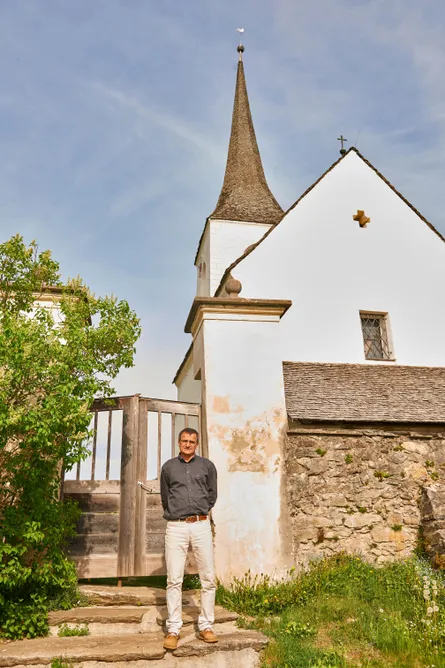 Spire, Monastery, Person, Portrait, Shelter, Adult, Male, Man, Pants, Clock Tower