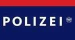 Das blau-rote Logo zeigt den Schriftzug 'POLIZEI' in weißen Buchstaben auf blauem Hintergrund mit einem weißen Adler-Symbol.