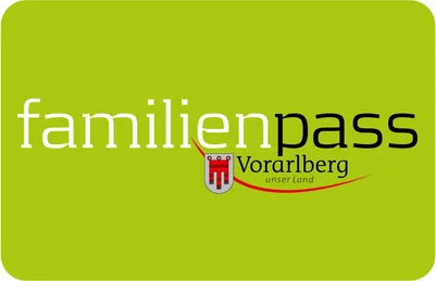 Das Bild zeigt einen grünen Hintergrund mit weißem Text, der 'millionpass' und ein Emblem mit 'Vorarlberg' und 'unser Land' liest. Das Emblem hat einen roten Rand.