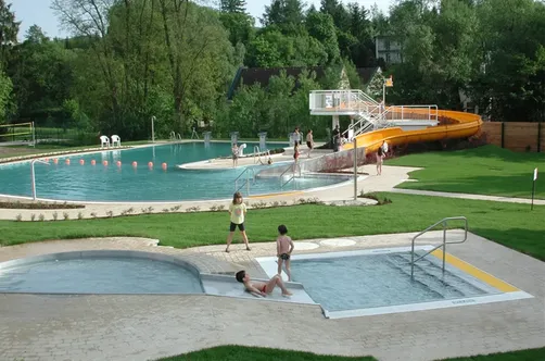 Pool, Water, Person, Outdoors, Grass, Plant, Swimming Pool, Building, Hotel, Resort