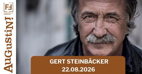 Ein Porträt eines älteren Mannes mit Schnurrbart und Bart, der eine schwarze Jacke trägt, mit dem Text 'GERT STEINBÄCKER 22.08.2026' darunter.