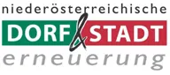 Das Logo für 'Niederosterreichische Dorf & Stadt Erneuerung' hat ein grünes und rotes Farbschema mit den Worten 'Dorf & Stadt' in weißer Schrift und einer schwarzen Linie, die die Wörter verbindet.