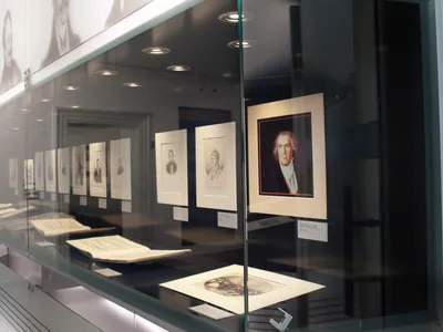 Building, Sword, Adult, Male, Man, Person, Indoors, Museum, Face, Suit