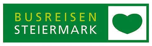 Grünes Schild mit den Worten Busreisen Steiermark und einem grünen Herzsymbol.