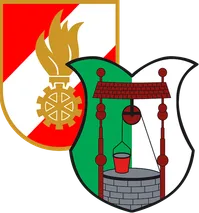 Ein heraldisches Emblem mit einem Brunnen mit einem roten Eimer, vor einem grünen und weißen Hintergrund, begleitet von einer Flamme und einem Zahnradsymbol auf einem roten und weißen Hintergrund.