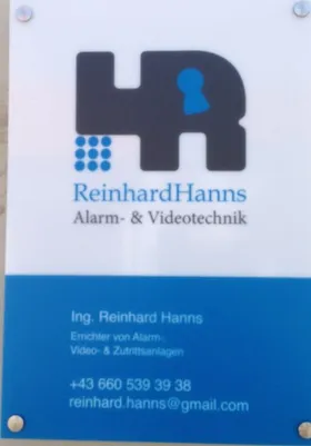 Ein Visitenkarte für Reinhard Hanns, ein Ingenieur, der sich auf Alarm- und Videotechnik spezialisiert hat.
