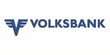 Das Volksbank-Logo zeigt ein stilisiertes 'V' mit Flügeln, vor einem weißen Hintergrund. Der Schriftzug 'Volksbank' steht in fetten blauen Buchstaben unter dem 'V'.